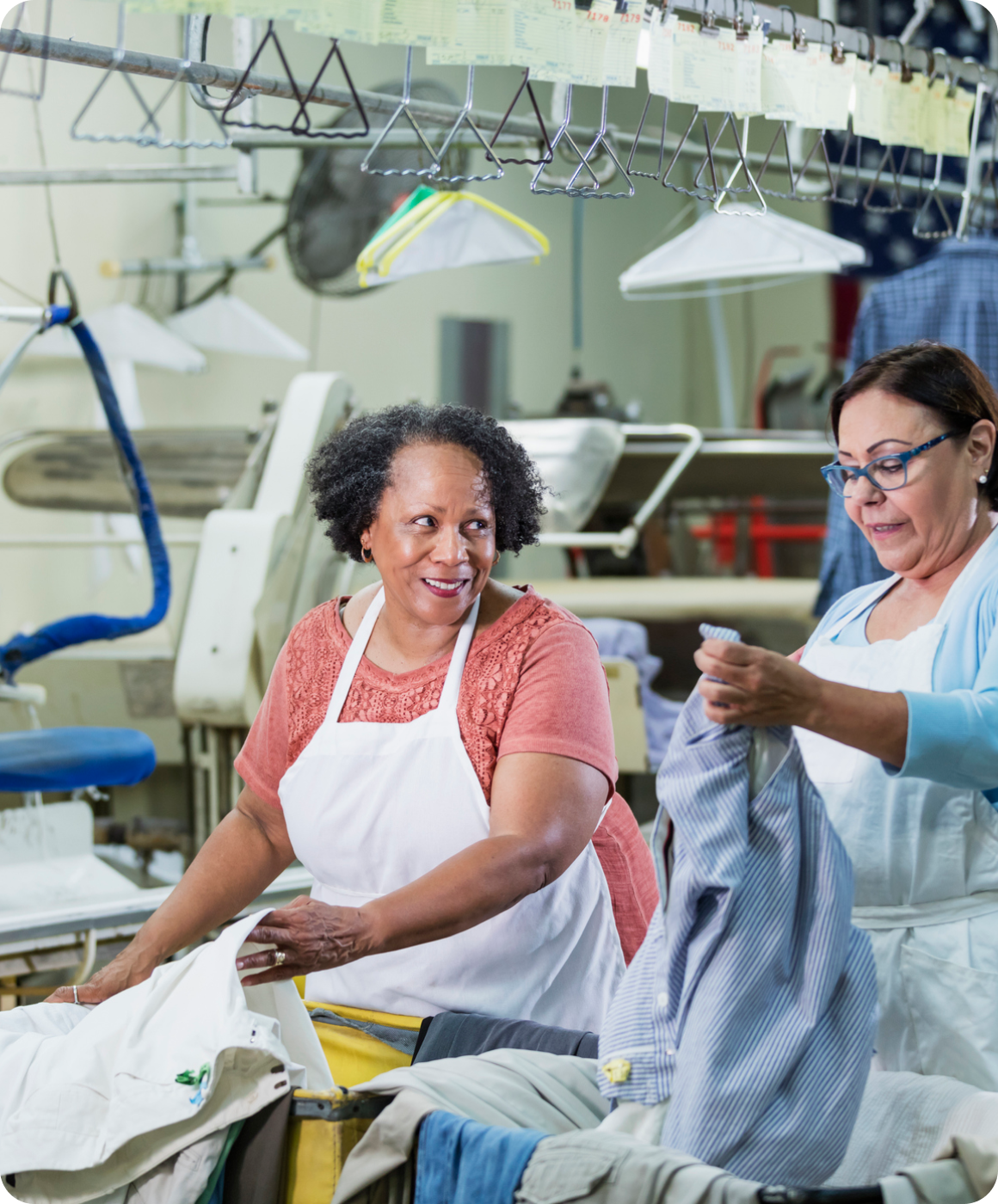 Women working in a laundry facility.